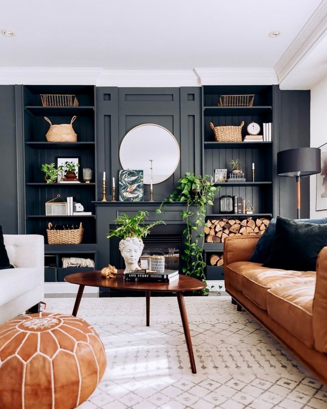 6. the Interwoven Moss and Wood Accent Wall with Geometric Shelving