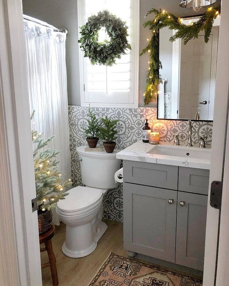 10. Snowflake Soap and Pine Cone Accents Transform a Minimalist Bathroom Sink