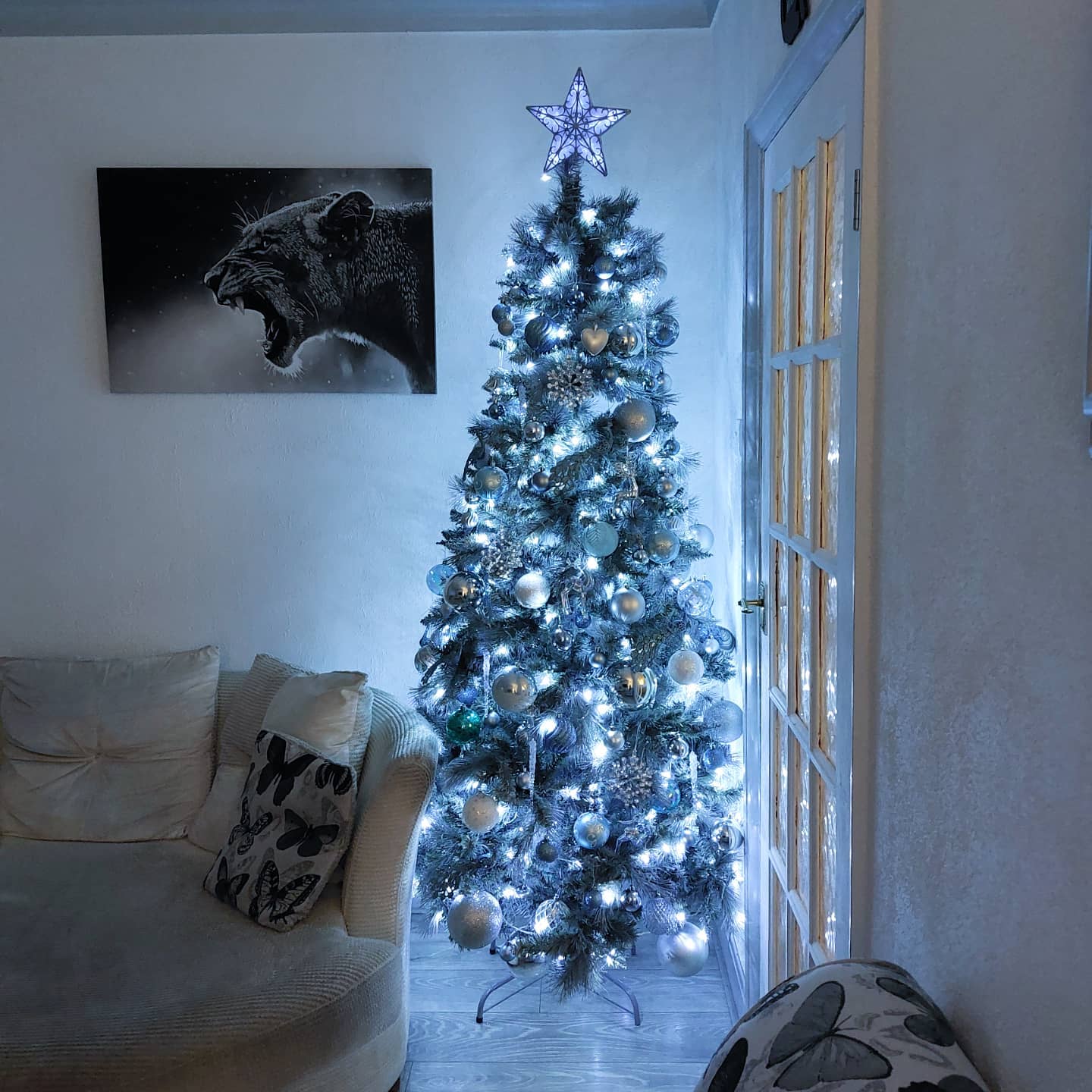 24. Frosted Pinecones and Sapphire Ribbons Woven Through Cobalt Baubles