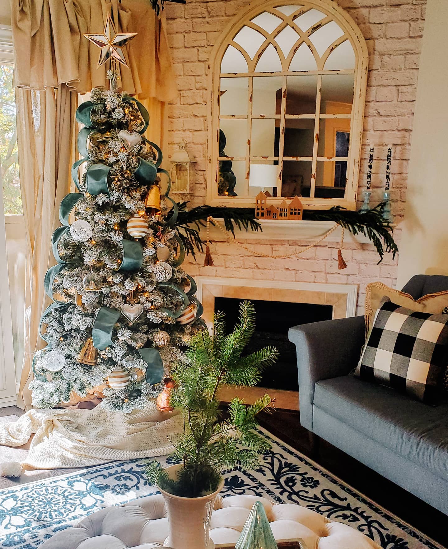 10. Twinkling Sapphire Ribbons and Frosted Pine Cones on a Midnight Blue Garland