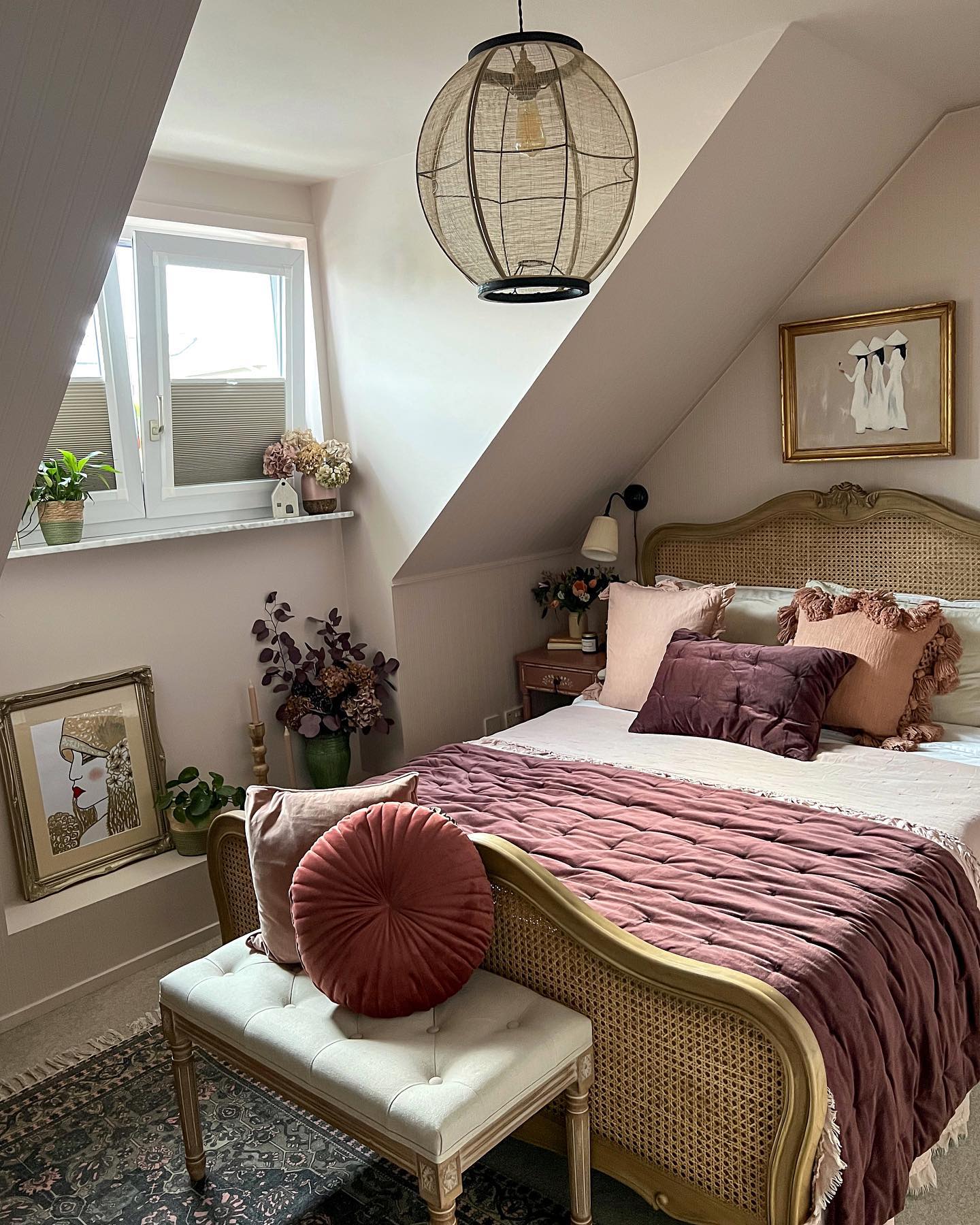 3. a Canopy Bed with Draped White Sheers Over a Plush Grey Comforter and Geometric Wall Art