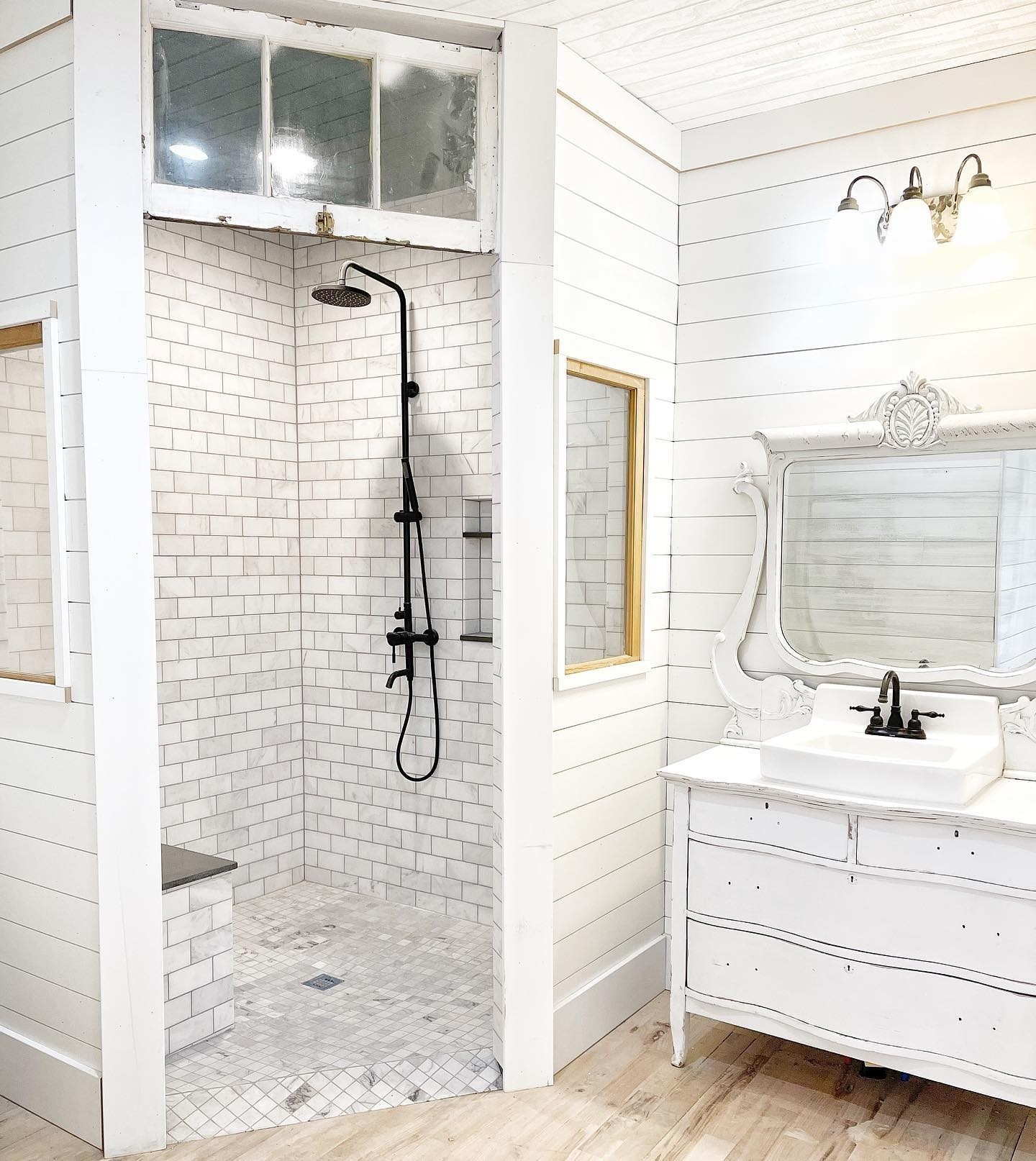 19. Copper Tub and Edison Bulb Illumination In a Rustic Retreat