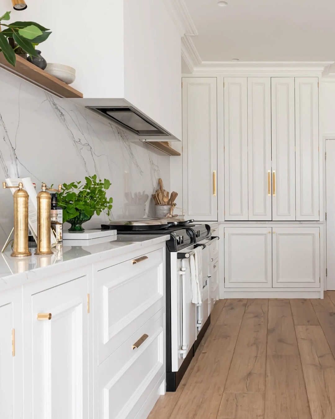 14. the Moonlit Quartz Countertop with Geometric Brass Handles Kitchen