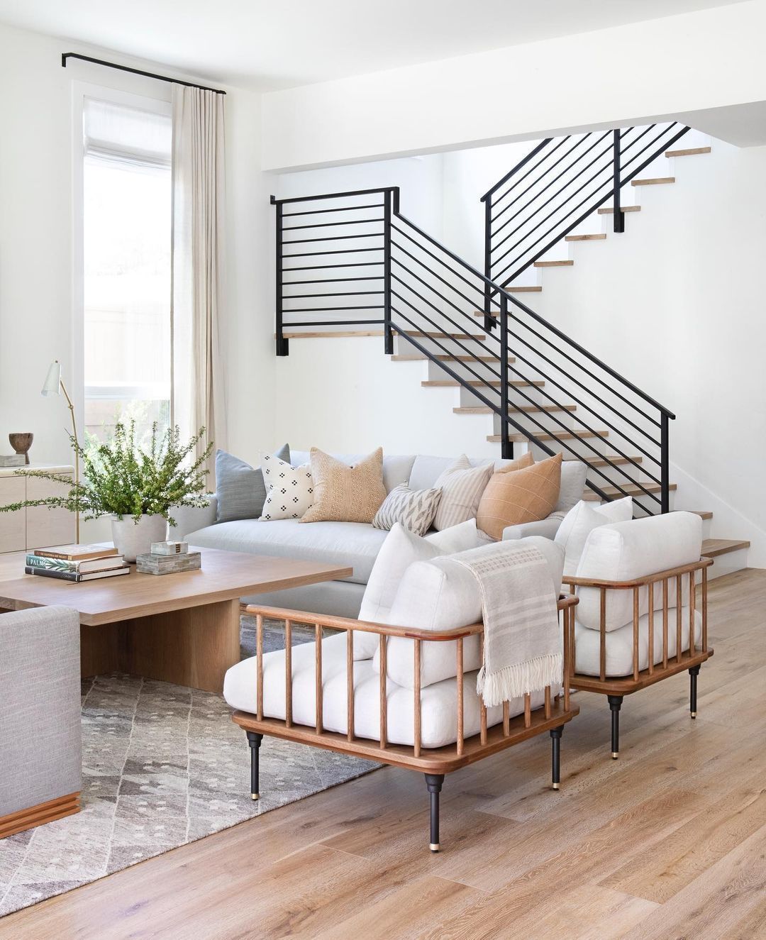 18. Minimalist Monochrome with Geometric Fireplace Accent