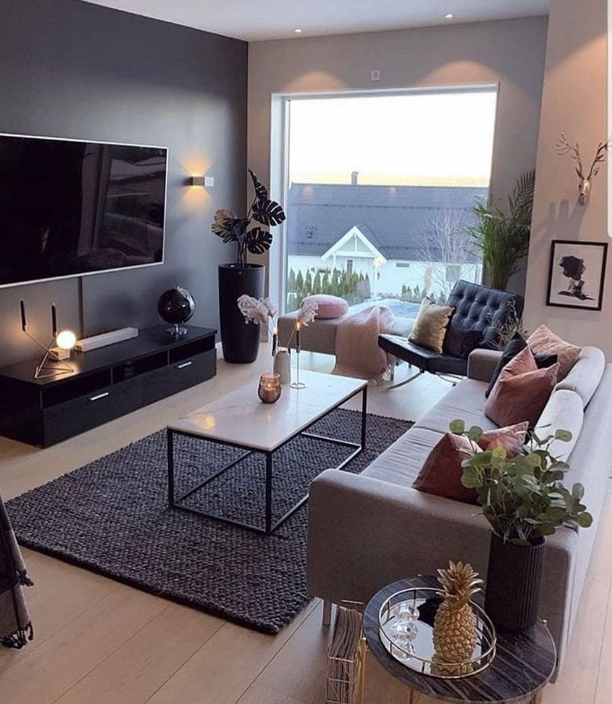 1. Cozy Nook with a Sunlit Bookcase and Plush Velvet Armchair In Dusty Rose