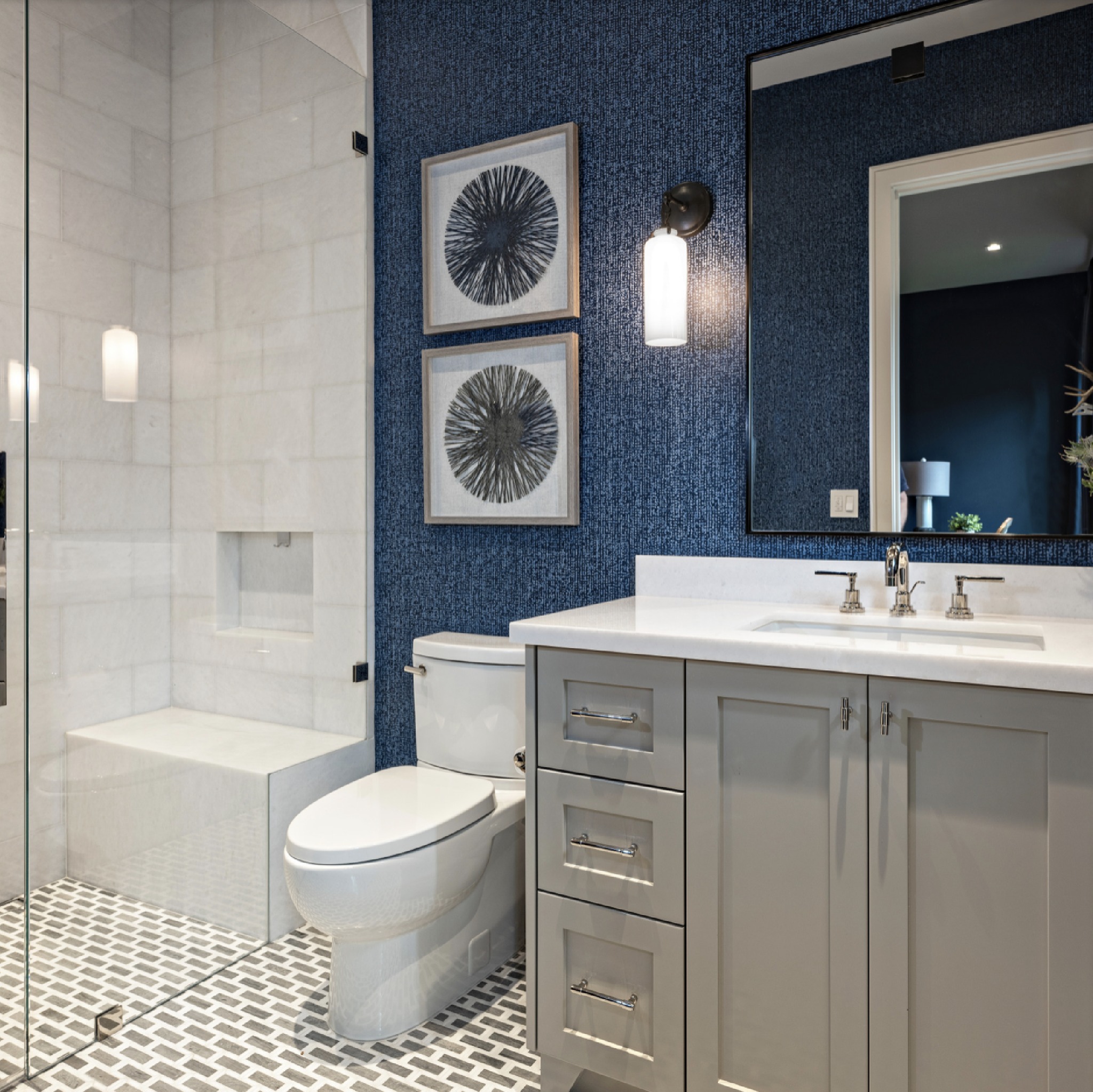 5. Under-cabinet Pull-out Baskets with Gold Accents and Geometric Wall Tiles