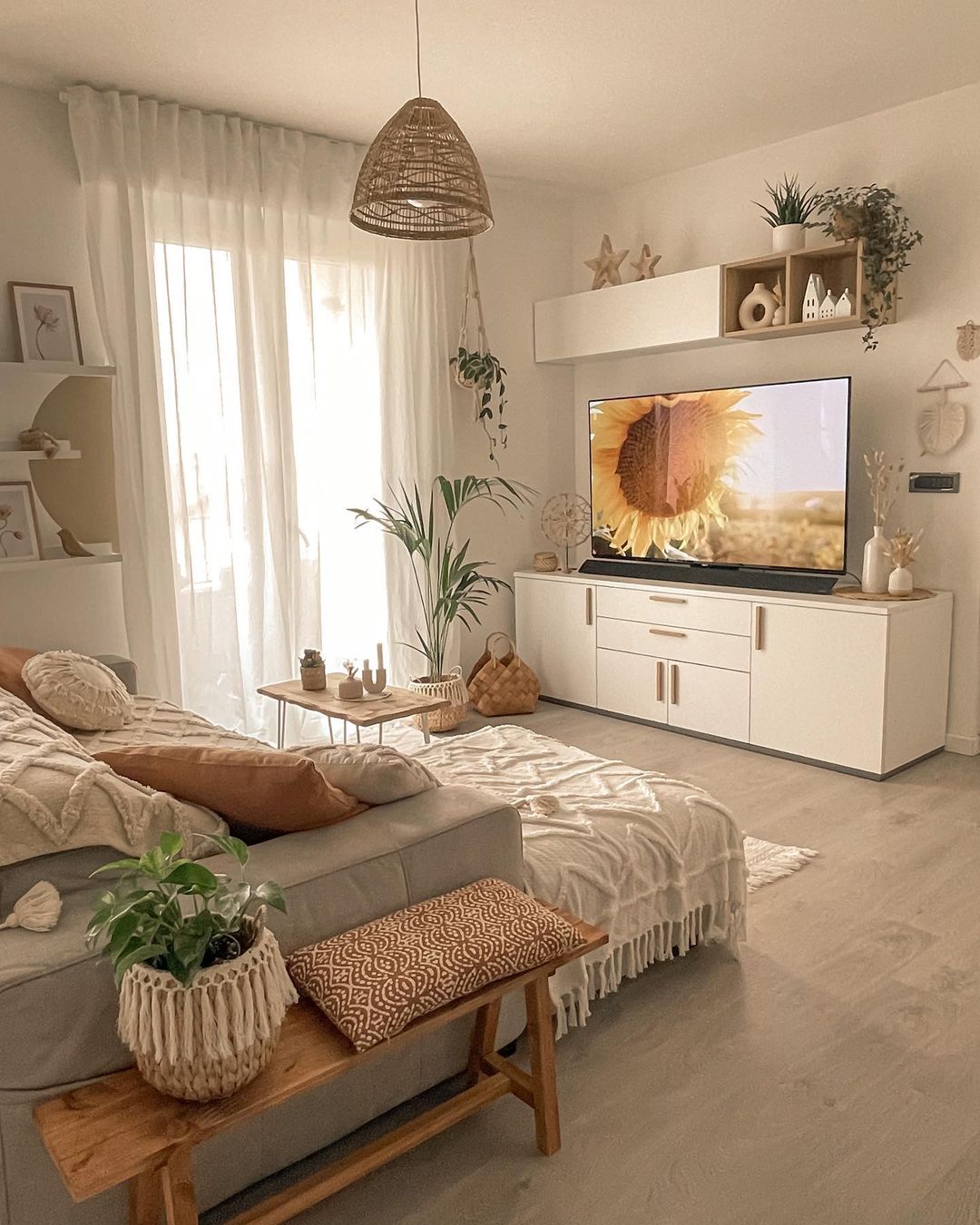 29. Moonlit Forest Green Sofa with Geometric Accent Wall: a Living Room Retreat