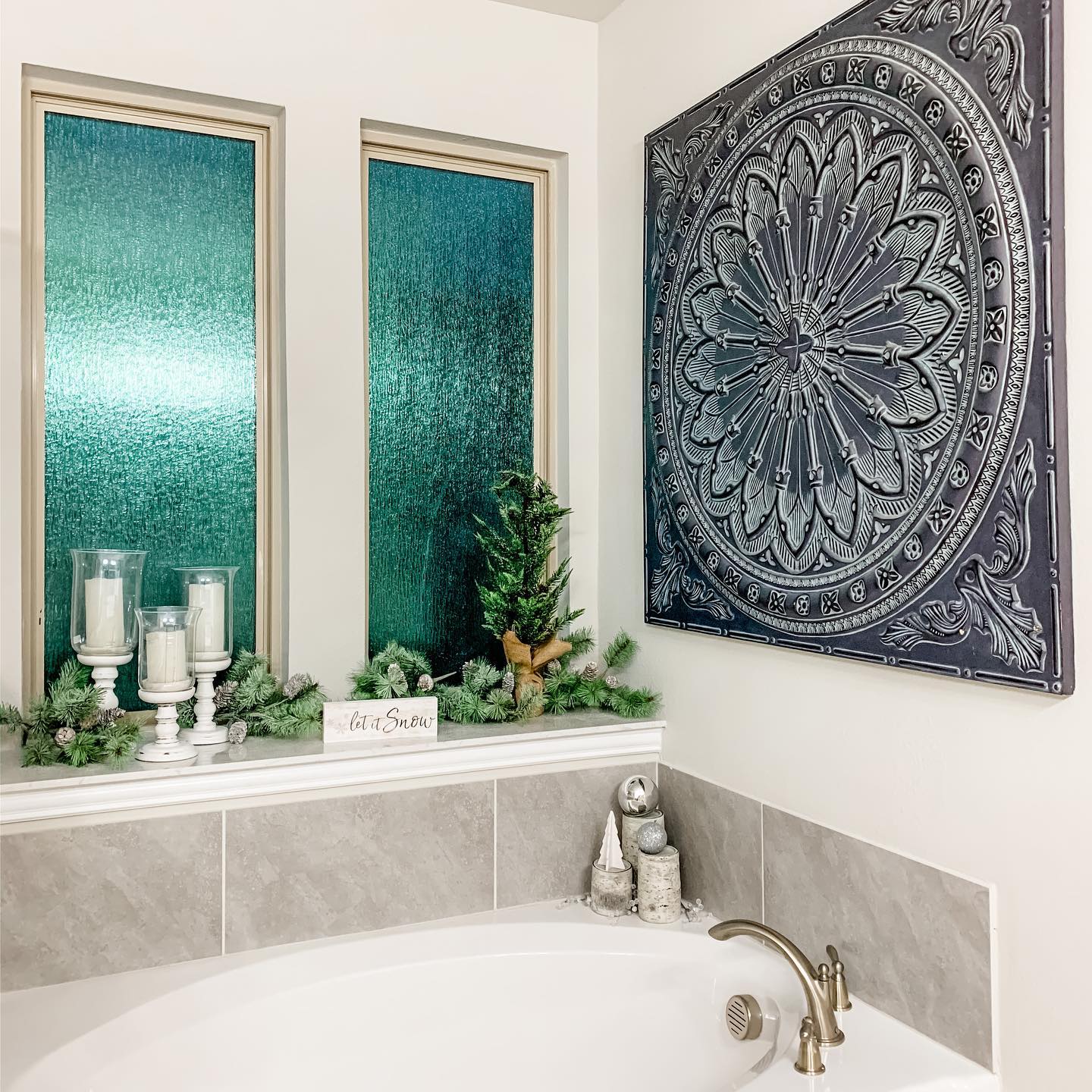 11. Festive Pinecone Garland Draped Over Vintage White Porcelain Sink