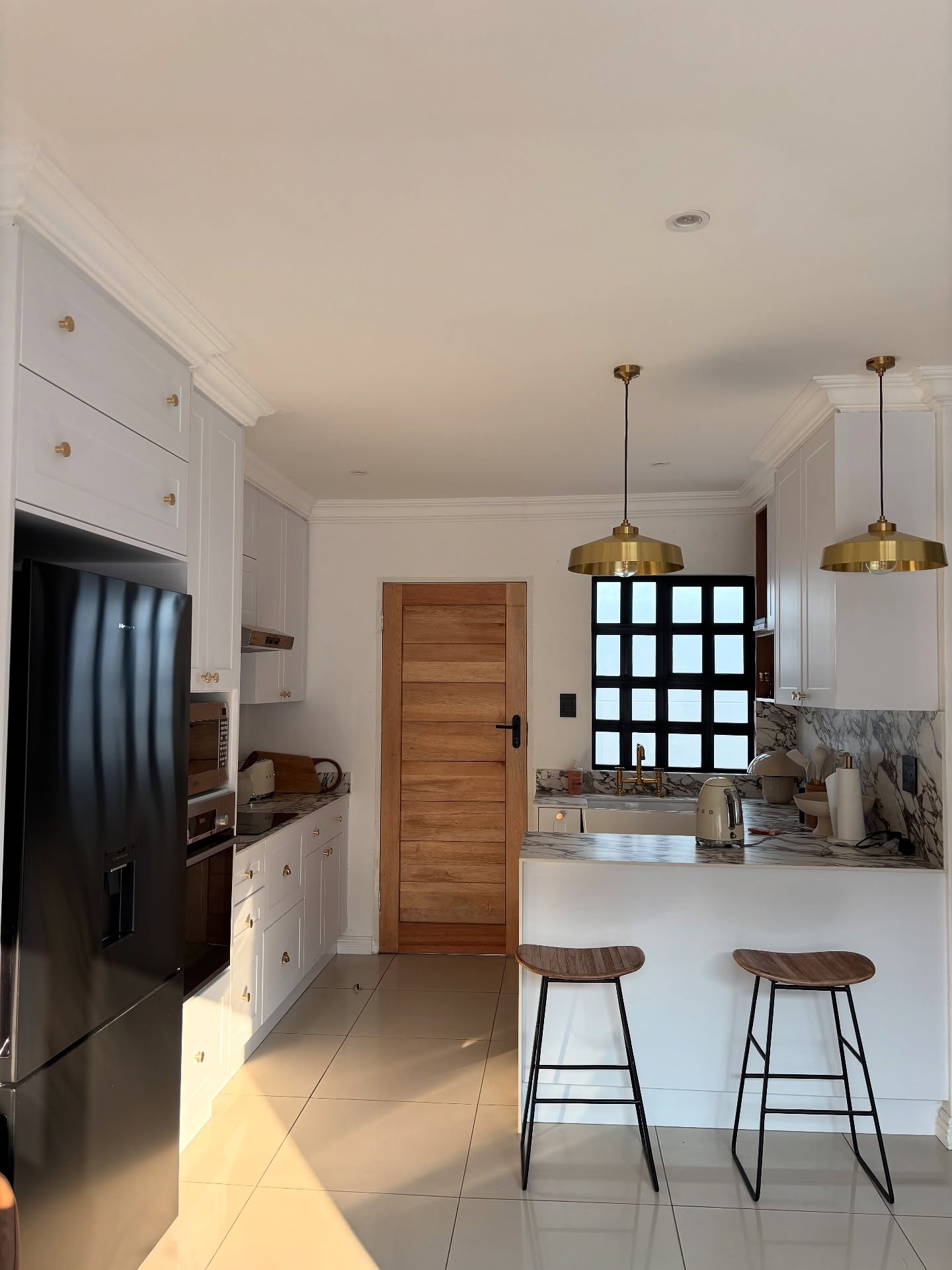 18. Miniature Galley Kitchen with Retro Green Fridge and Open Shelving