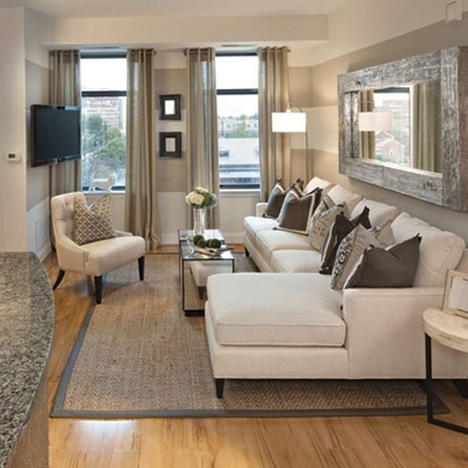 2. the Teal Armchair and Geometric Rug Ensemble In a Compact Living Space