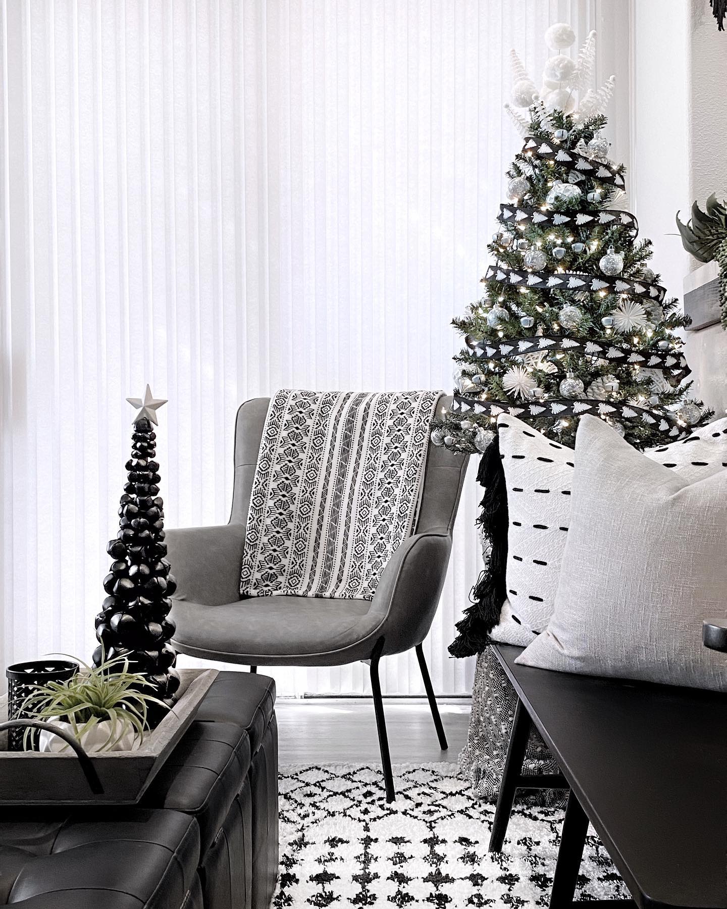 15. Midnight Frost on Pine: a Monochrome Christmas Wreath with Delicate Snow Accents