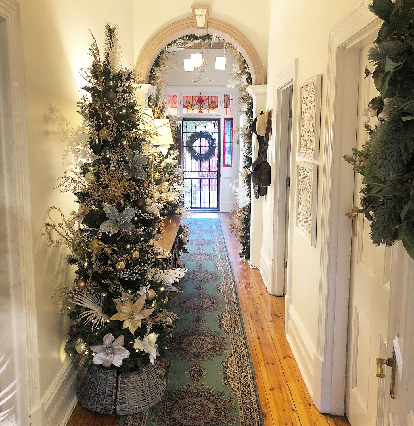 18. Cascading Ribbons and Pinecones on a Crimson Garland Staircase