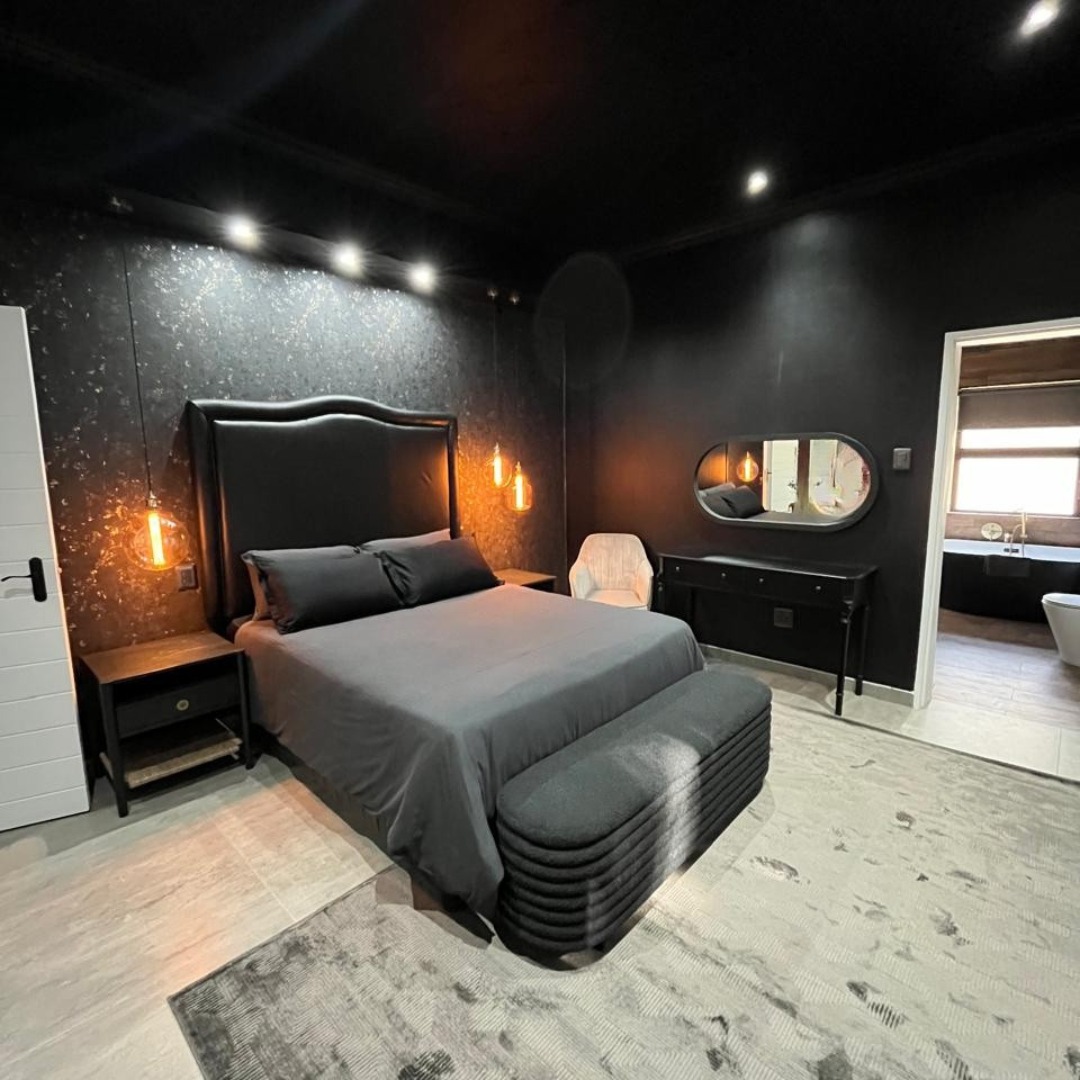 20. Midnight Velvet Canopy: a Bed Enveloped In Draped Elegance