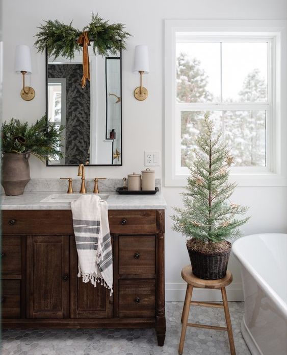 2. Snowy Pinecone Soap and Red Ribbon Towel Display on Vintage White Sink
