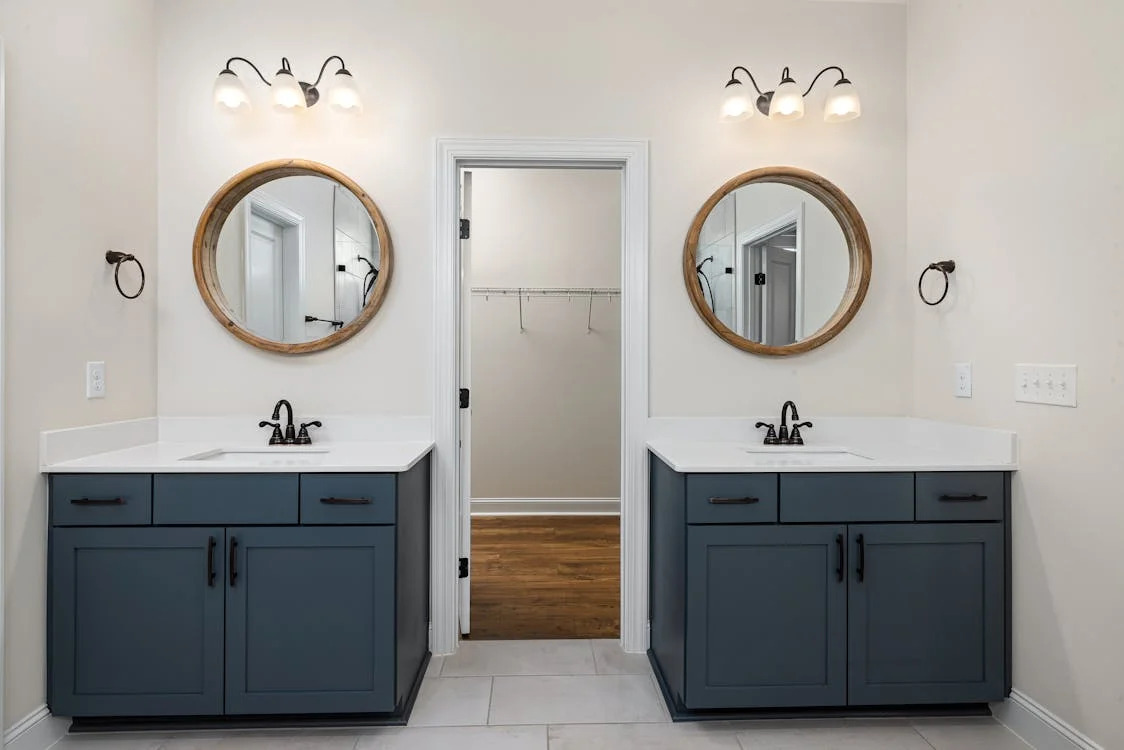 5. Midnight Indigo Mosaic Tiles Frame a Vintage Sink In a Cozy Corner