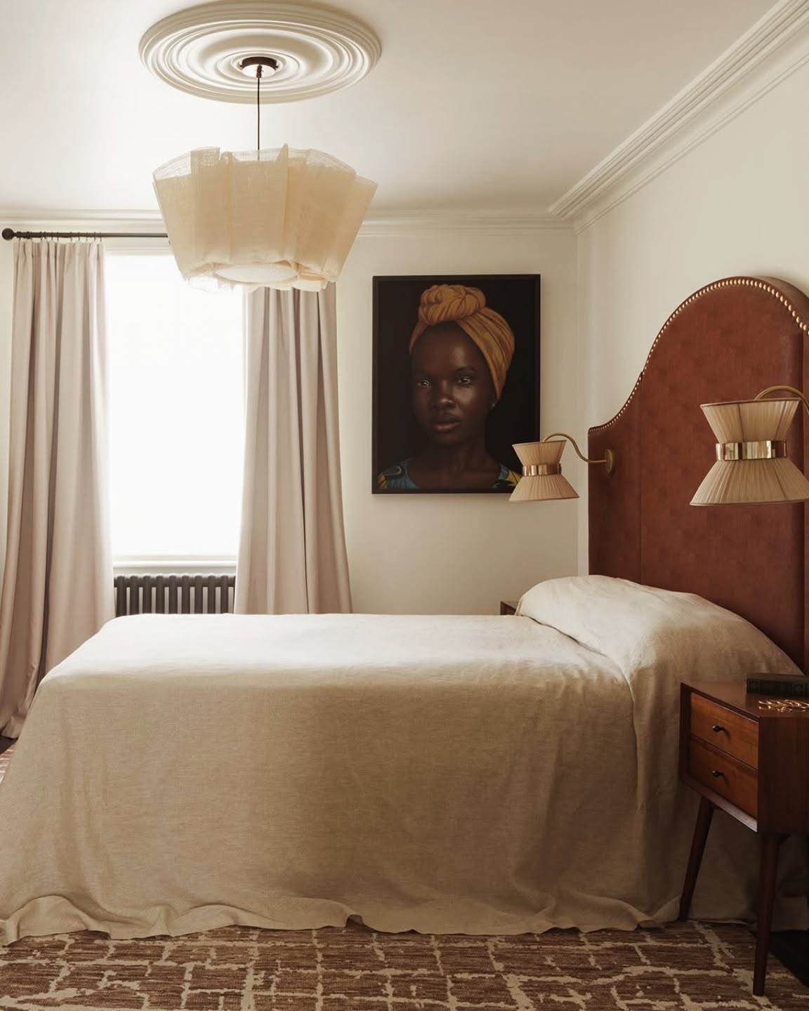 12. Moonlit Serenity: a Bedroom with a Floating Bed and Circular Wall Art