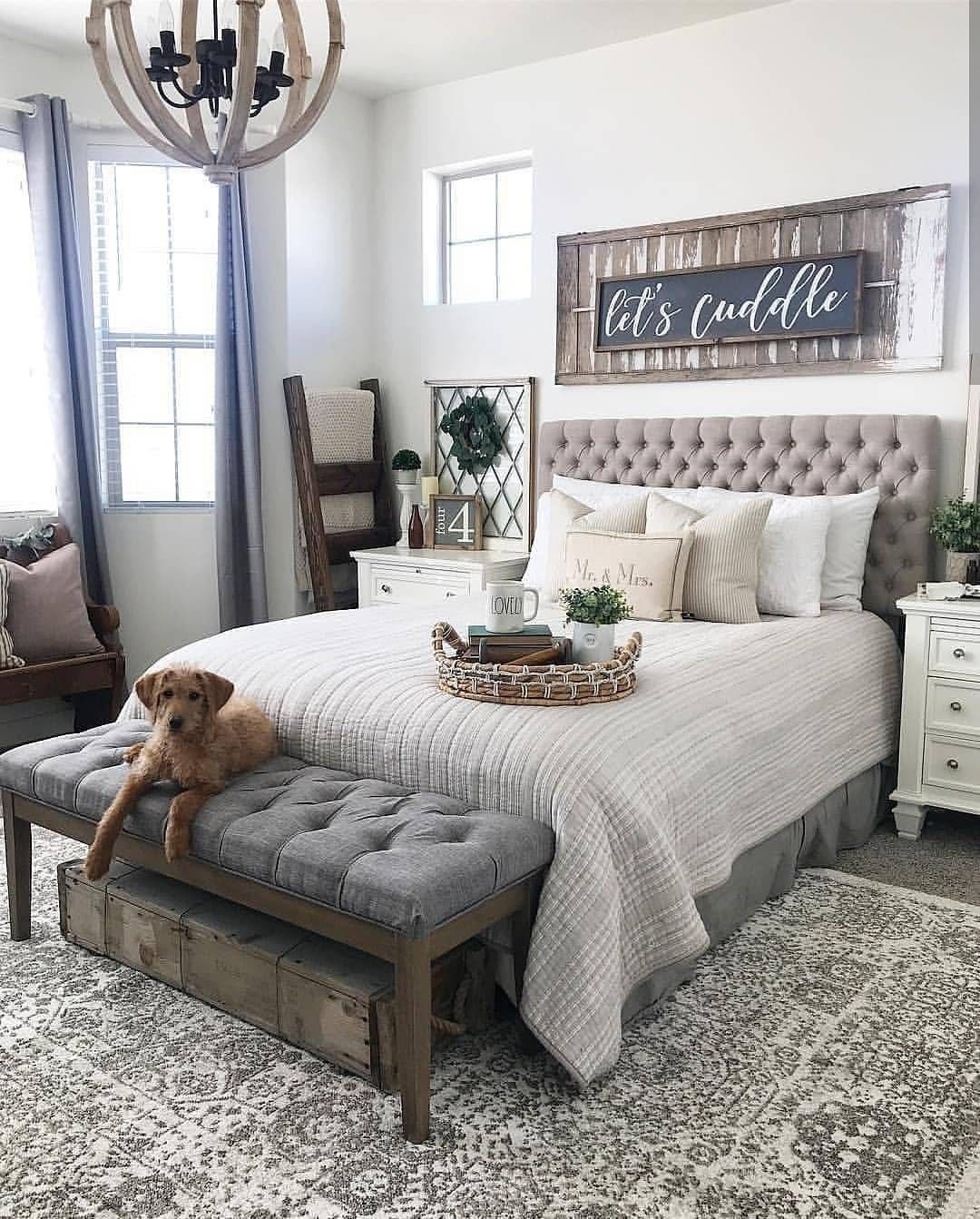 2. Farmhouse Charm with a Canopy Bed and Vintage Trunk Nightstand