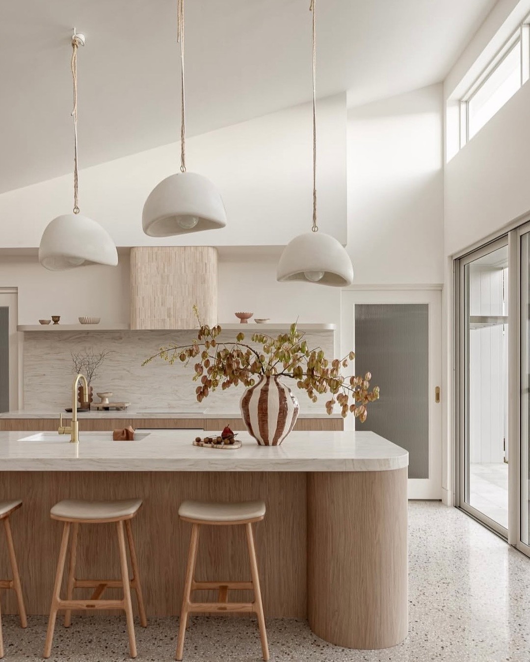 20. the Fusion Of Industrial Steel and Warm Wood In a Kitchen Island Haven