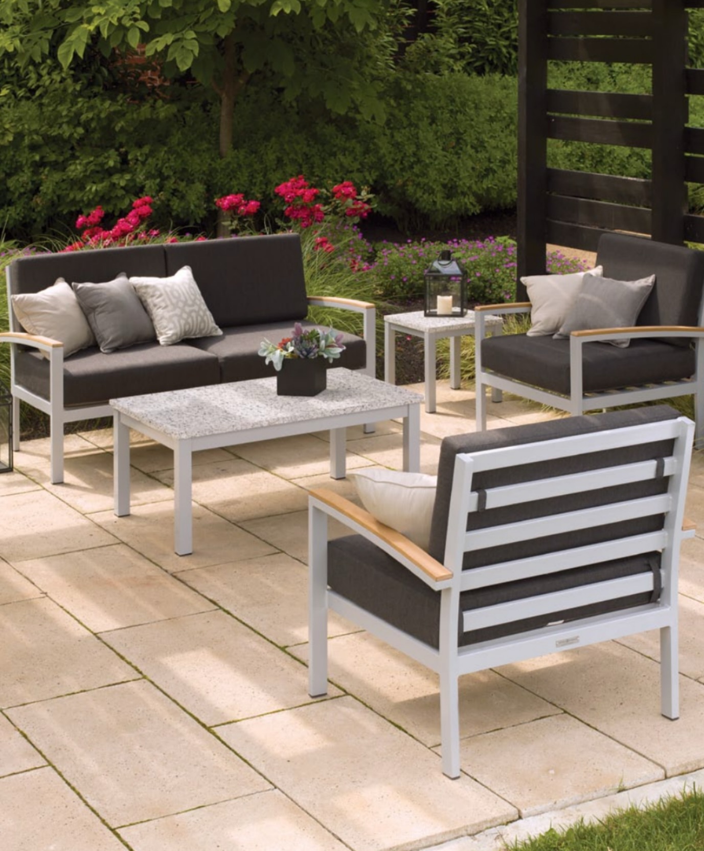 14. the Woven Wicker Lounge with Geometric Sun Shade and Mosaic Side Table