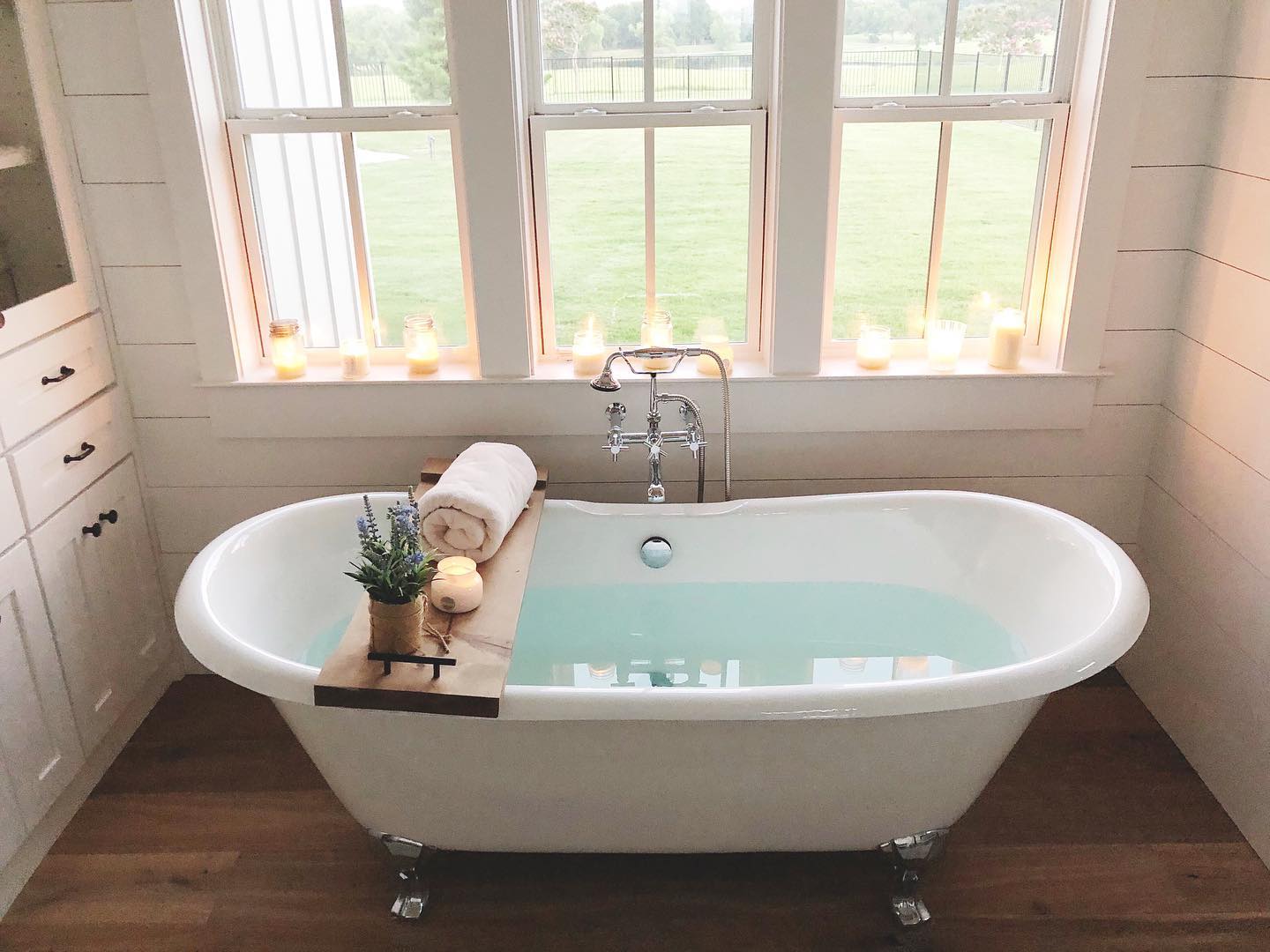 9. the Whimsical Waves Of Shiplap with a Floating Vanity Nook