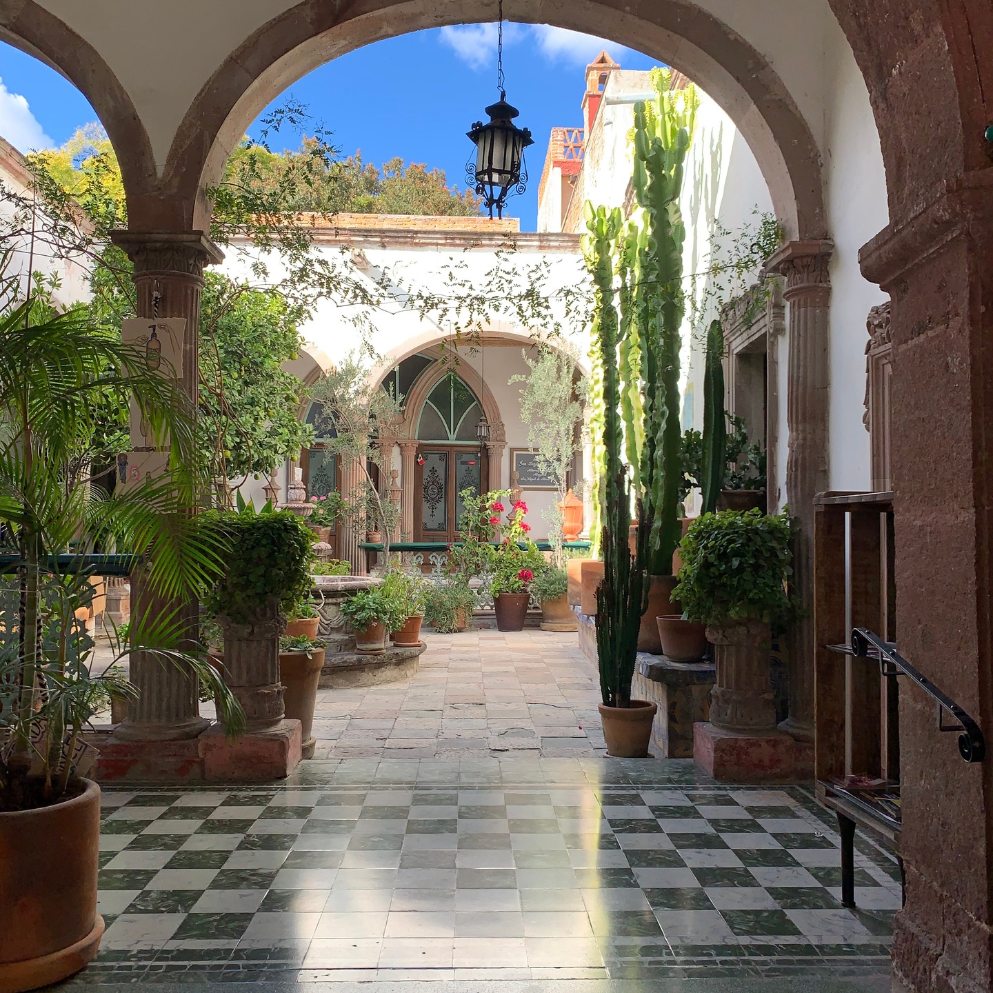 13. Sunlit Terracotta Archways and Vibrant Bougainvillea Canopy