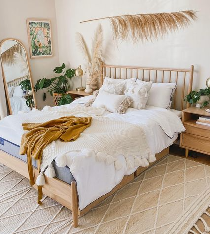 10. Earthy Tones Meet Geometric Patterns: a Bedroom with Hexagonal Wall Accents and Warm Lighting