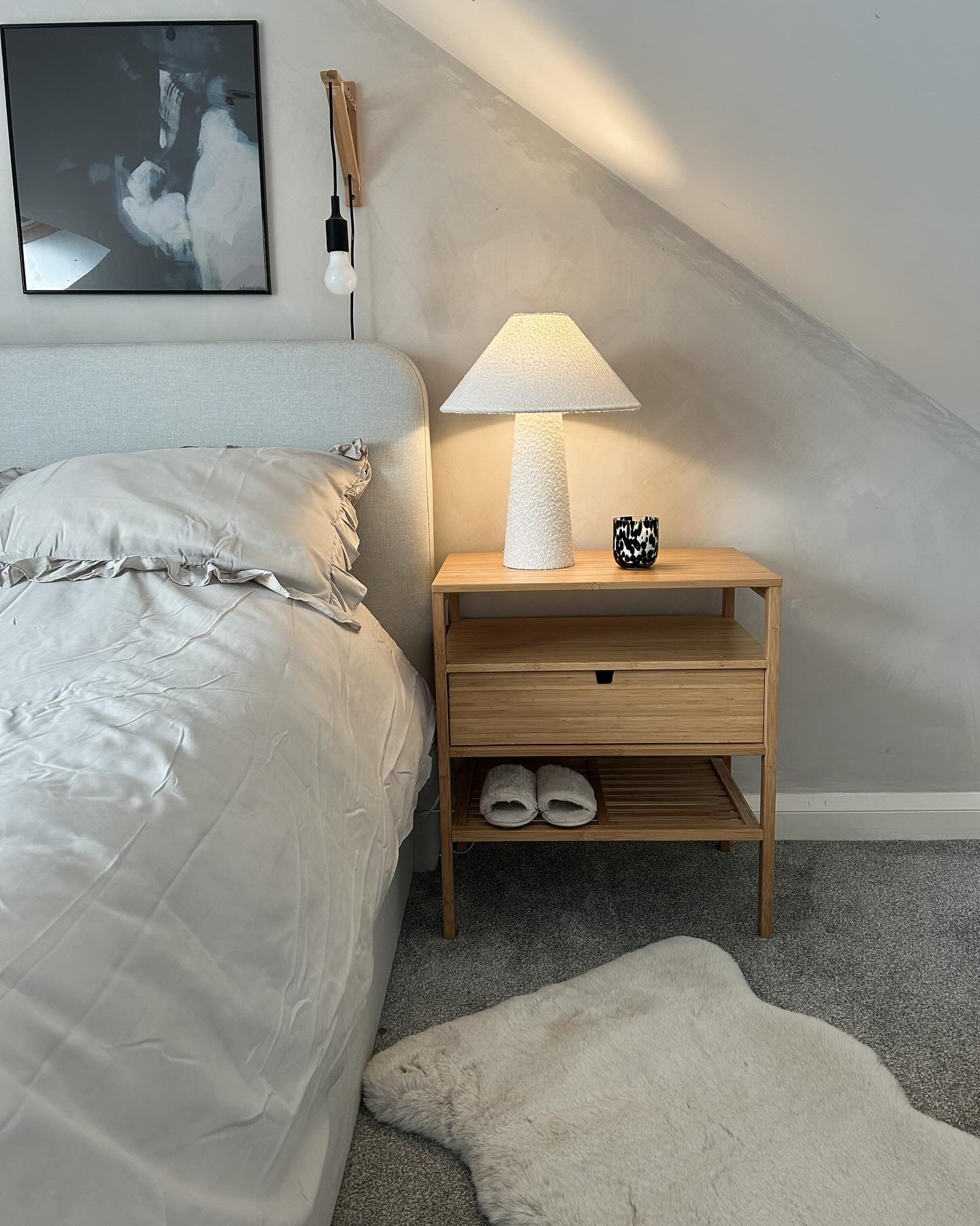 37. Soft Beige Waves Meet Geometric Shadows In a Minimalist Haven