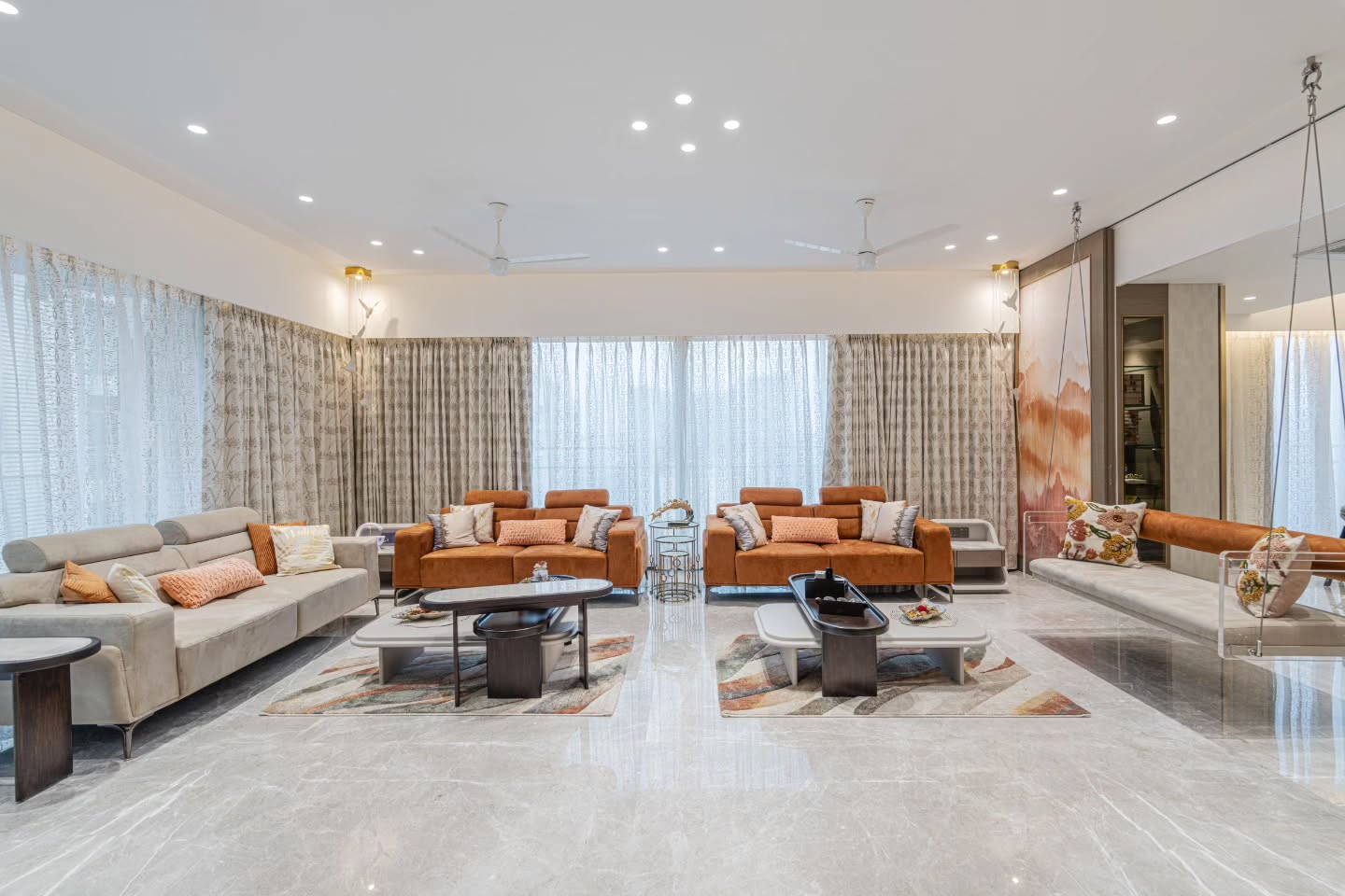 35. Velvet Plum Sofa and Geometric Gold Mirror: a Fusion Of Luxury and Edge