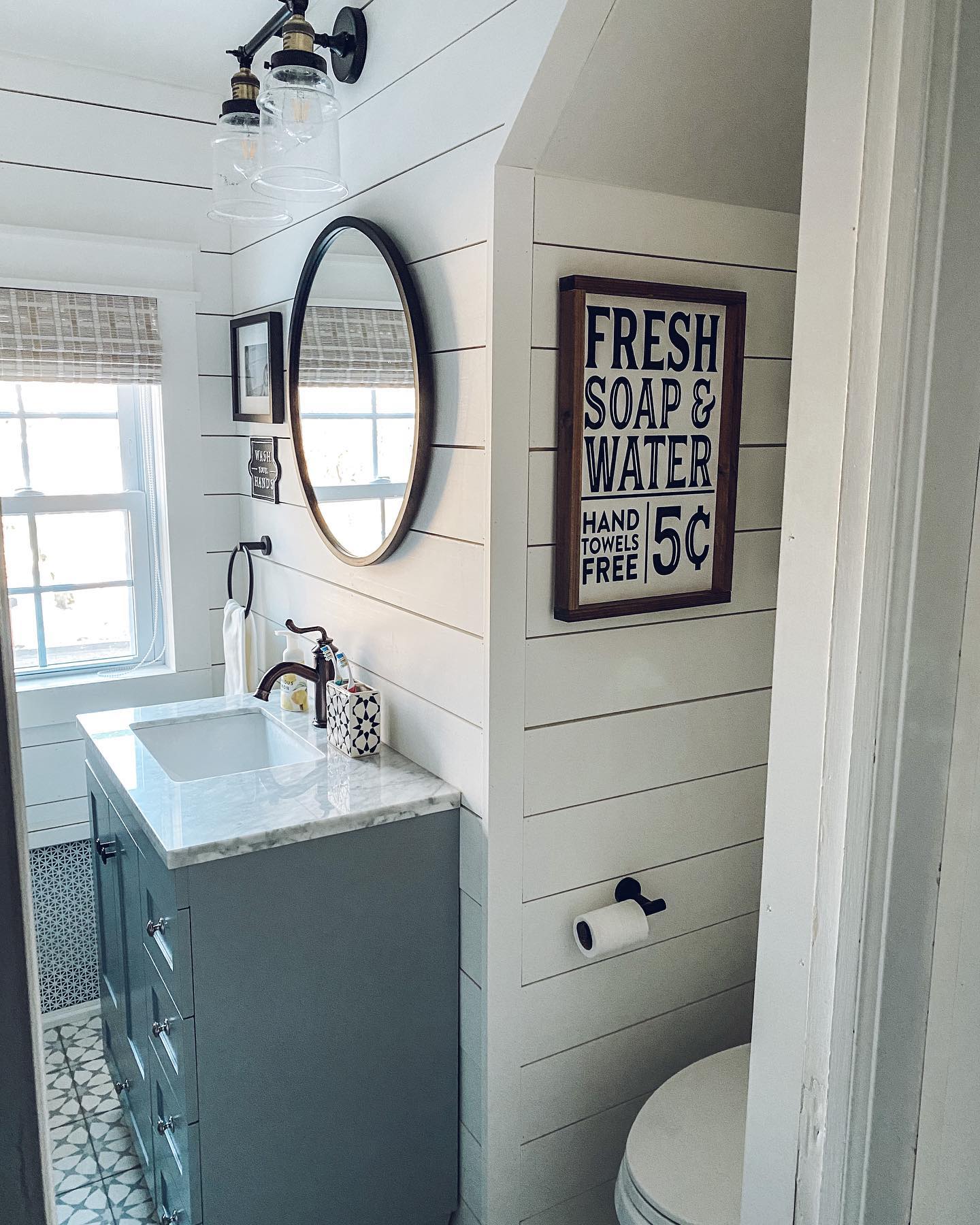 6. Shiplap Serenity with a Floating Vanity and Geometric Tiles
