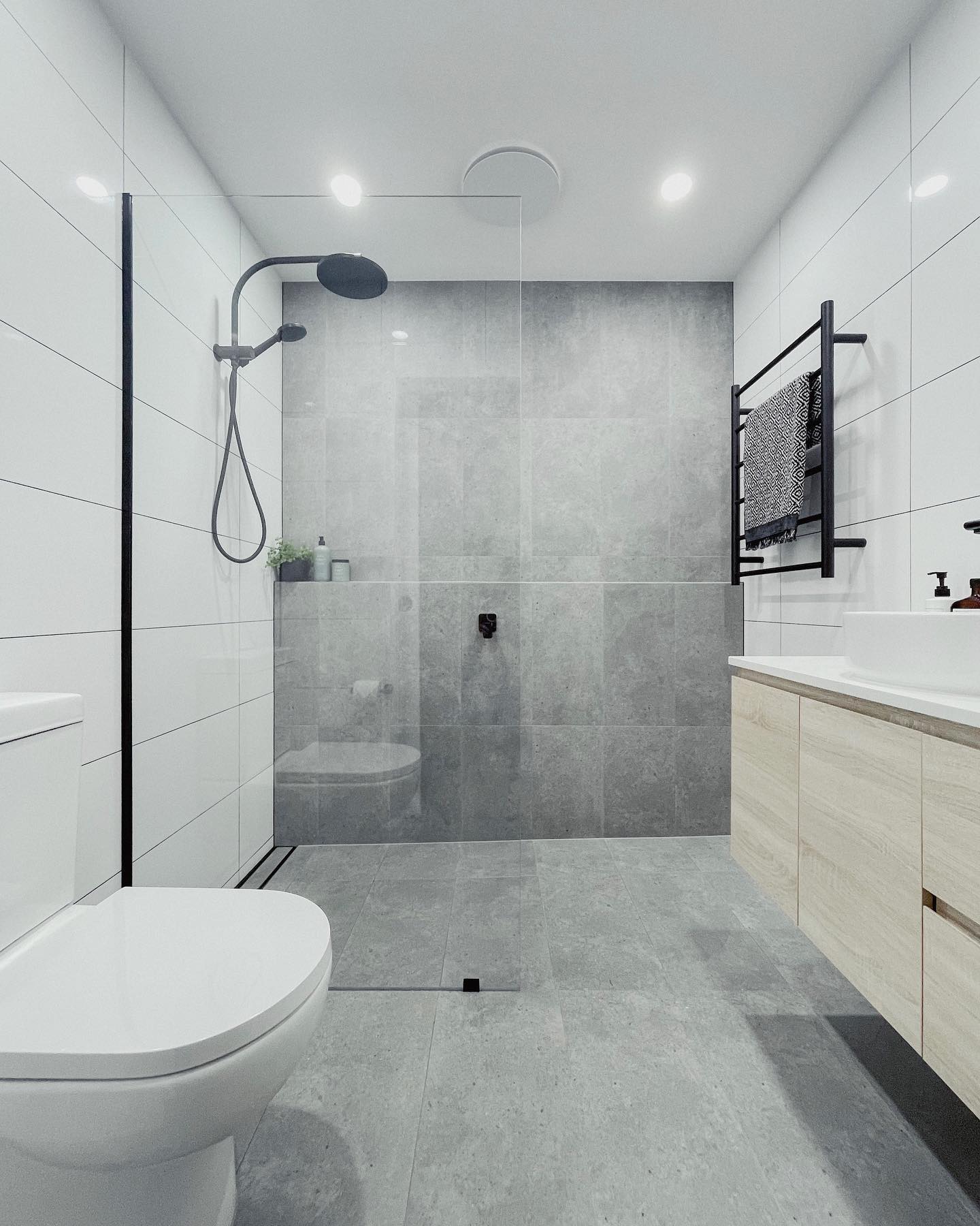 13. a Monochromatic Dance Of Geometric Tiles and Curved Fixtures