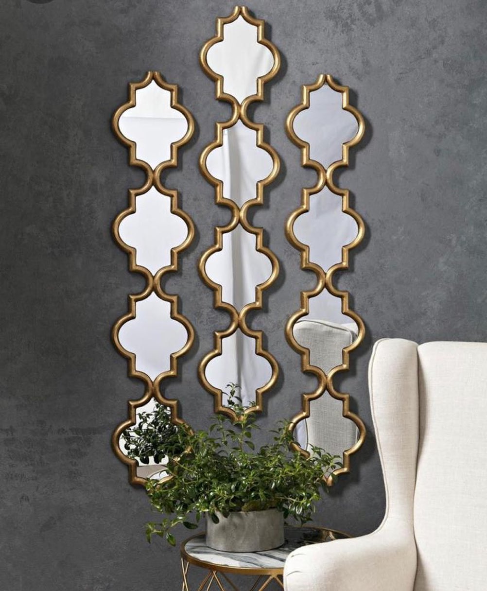 8. the Geometric Dance Of Mirrors Against a Cobalt Blue Wall