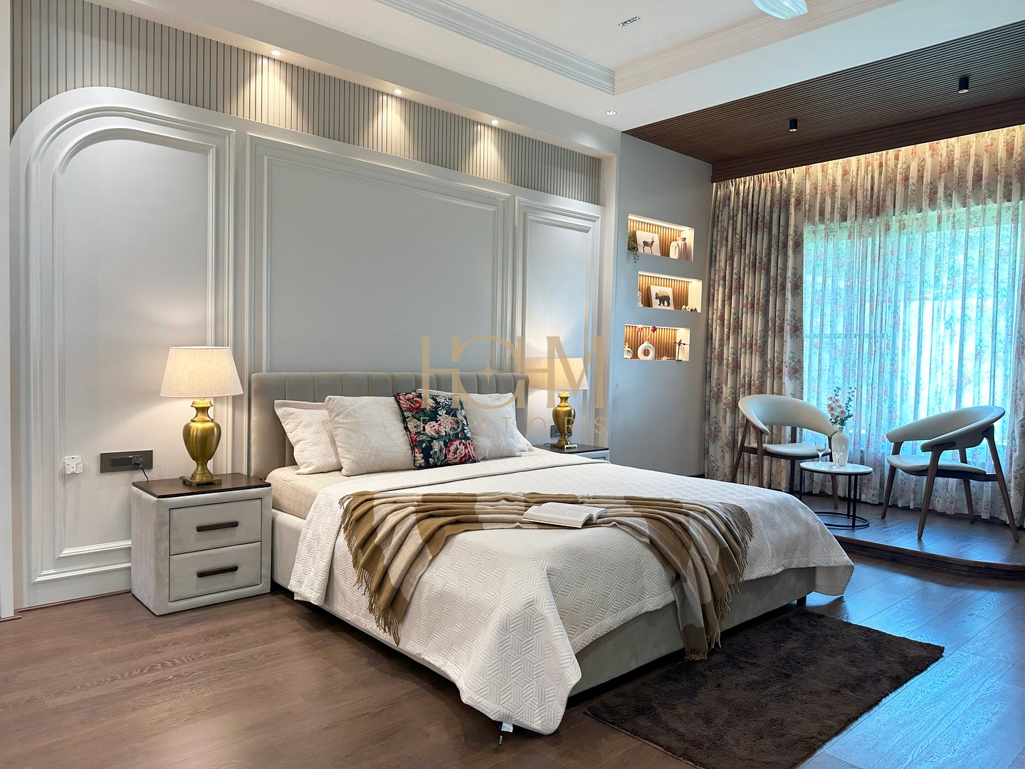 2. Twilight Blue Accents Meet Geometric Patterns In a Master Bedroom Oasis