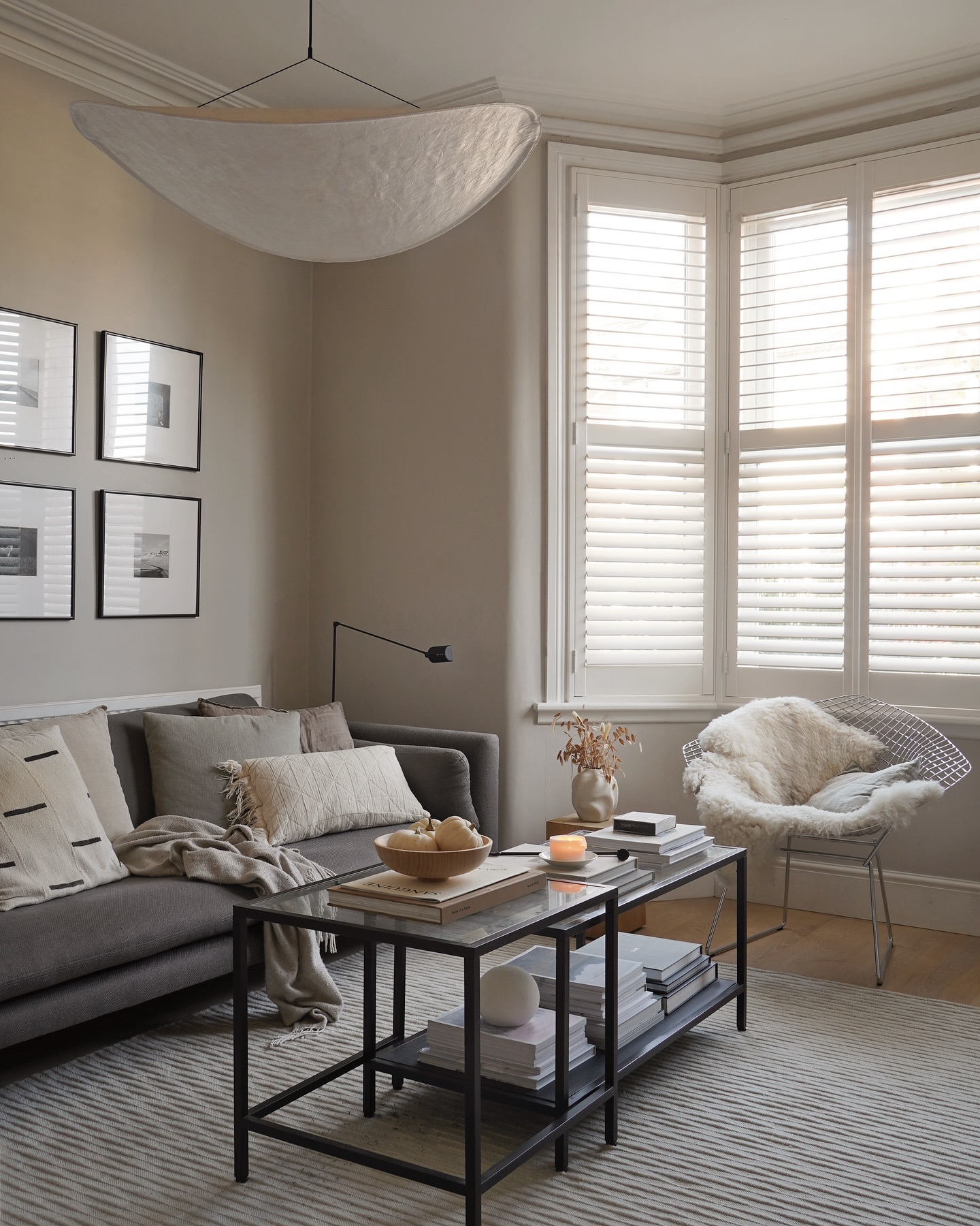30. a Monochrome Haven with a Singular Pop Of Orange In the Curved Vase