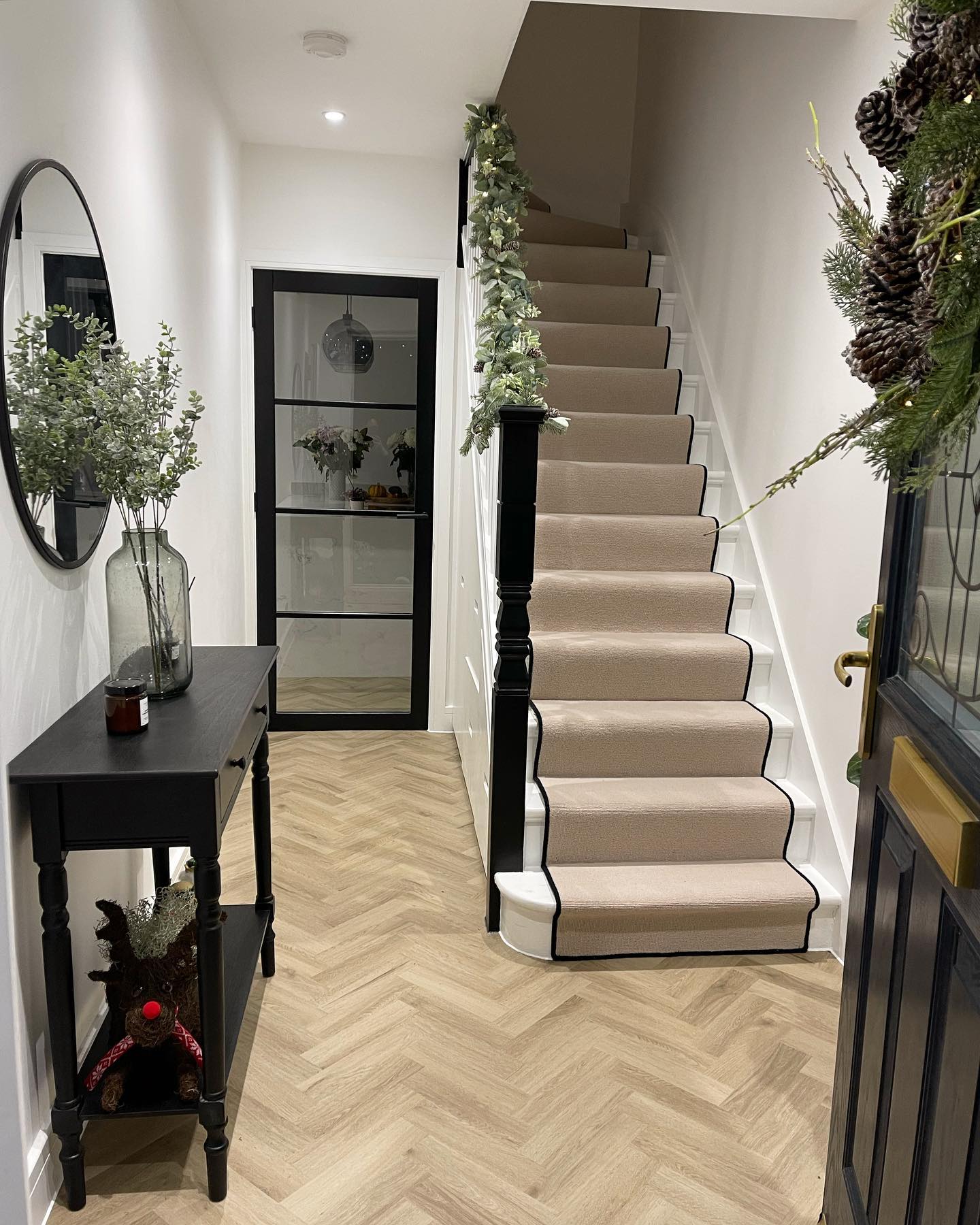 20. Crimson Ribbons and Golden Glow: a Festive Hallway Transformation