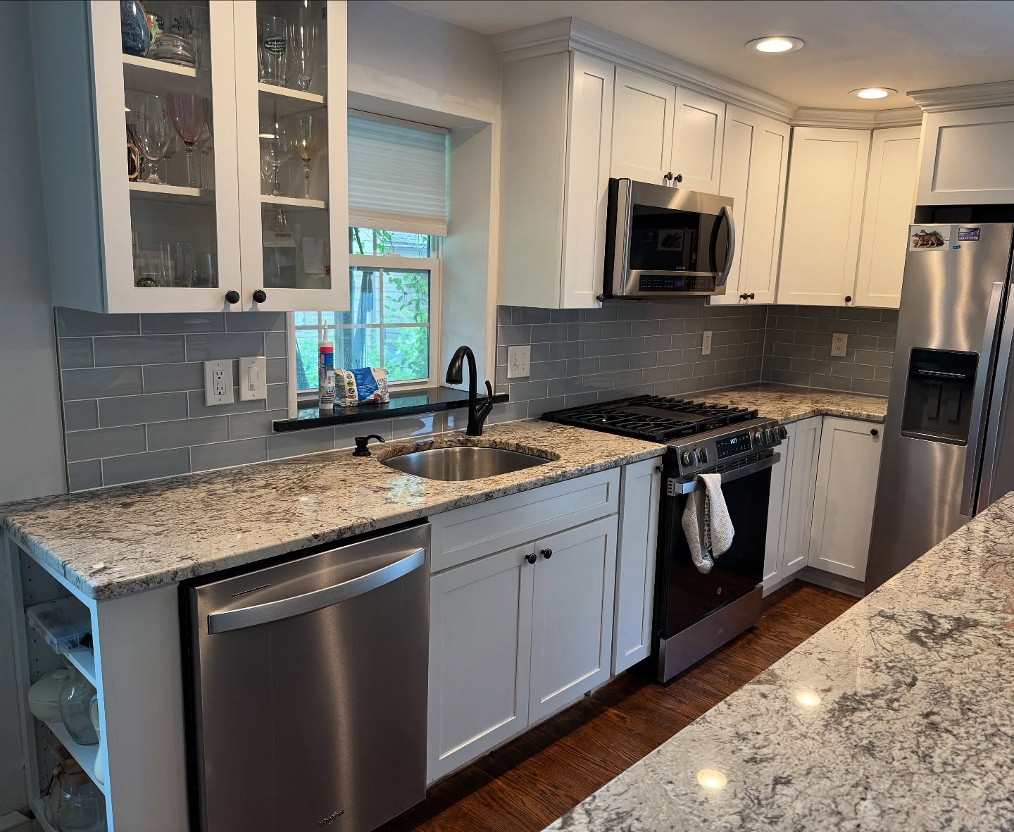 29. Vibrant Mosaic Of Cobalt and Amber Glass Tiles Interwoven with Metallic Accents