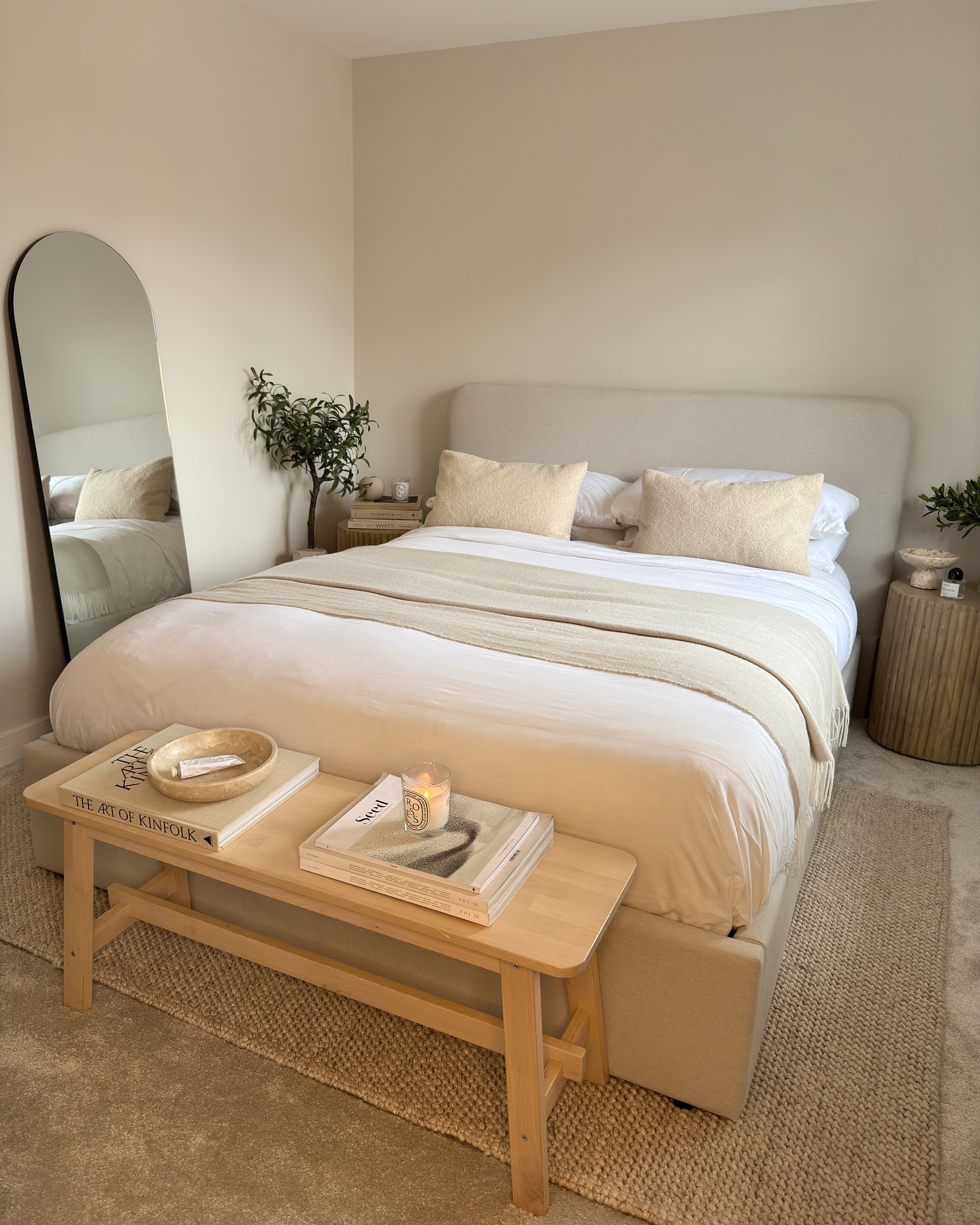 34. Soft Taupe Walls and Geometric Bedding In a Minimalist Haven