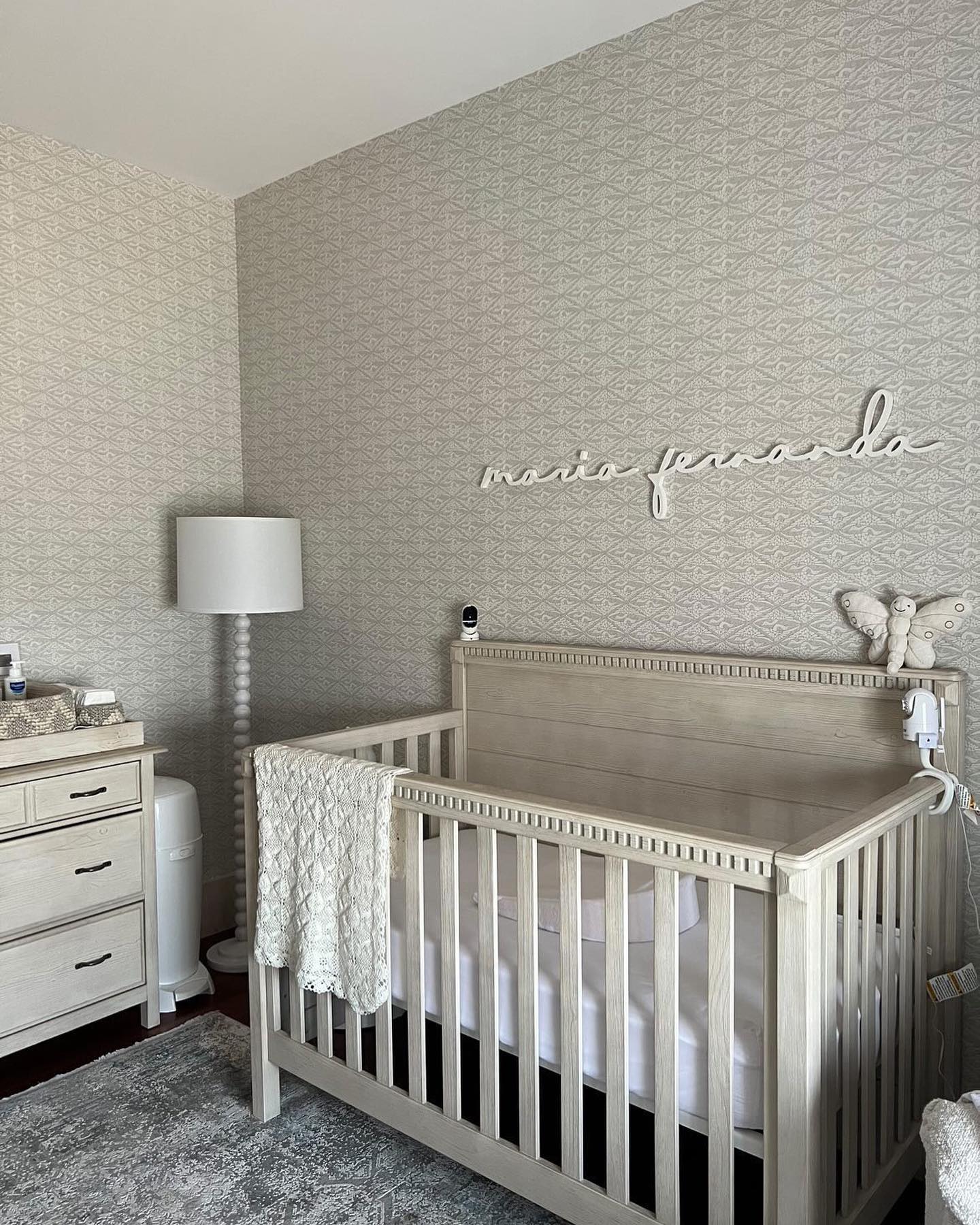 17. Soft Clouds and Geometric Dreams: a Nursery with a Floating Mobile and Monochrome Magic