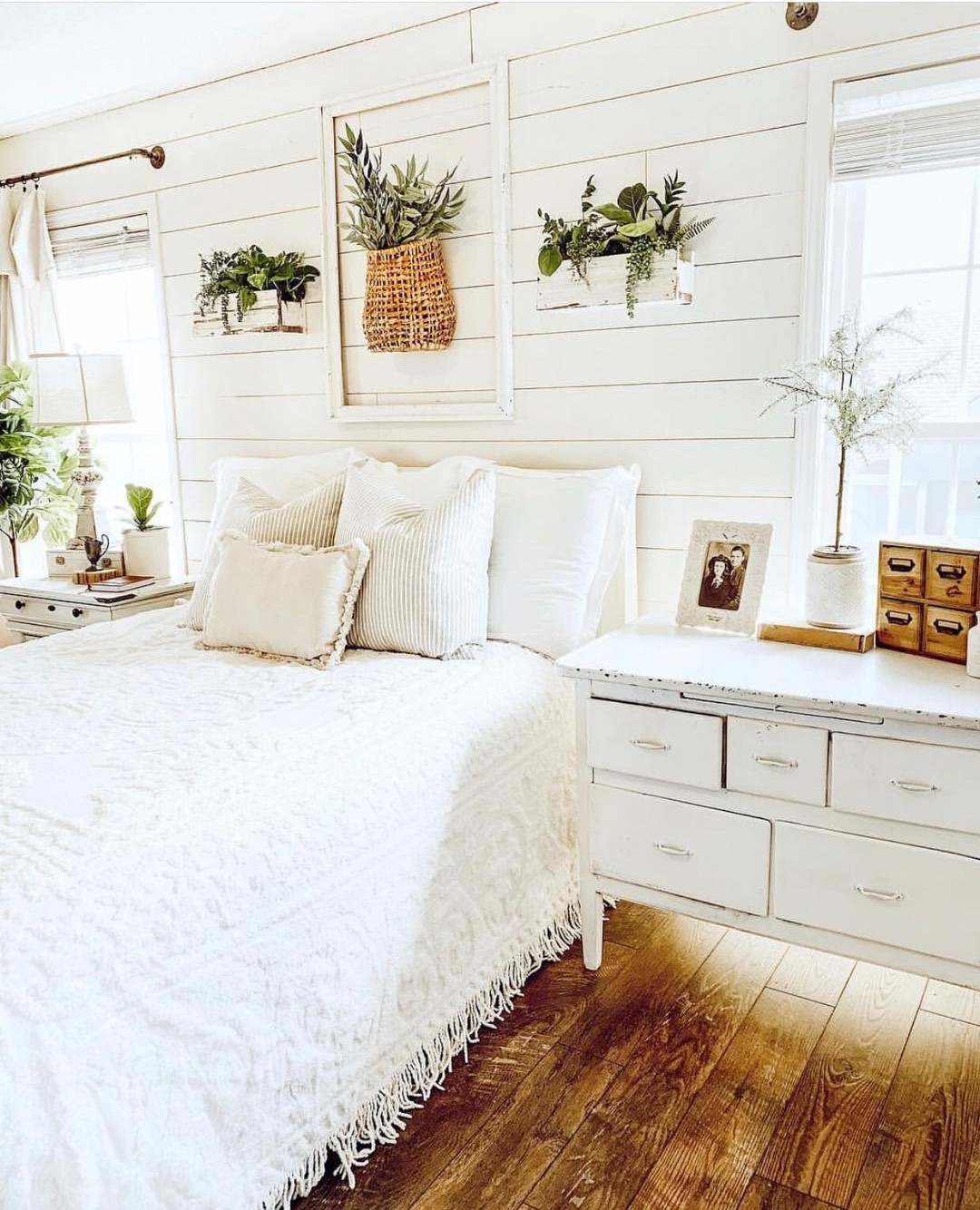 27. a Sunlit Haven with a Vintage Quilt and Woven Basket Bedside