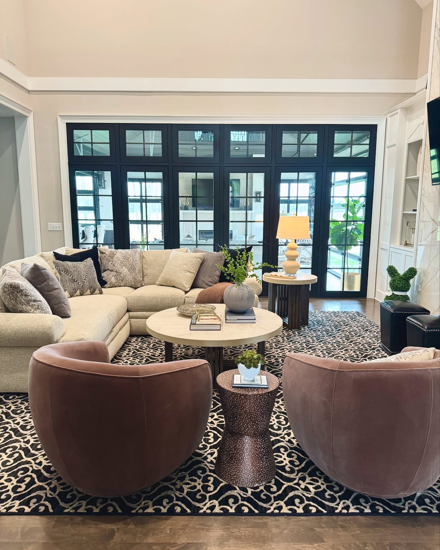 42. Cozy Nook with a Crimson Velvet Armchair and Geometric Wall Art